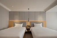 Zhuyuan Hotel (Maoming Electric Bai Wanda Plaza Branch) - Airport Shuttle