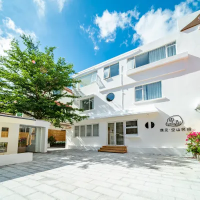 Haikou Occasional Empty Mountain Homestay (Jinniuling Park Branch) Hotel berhampiran Jinniuling Park