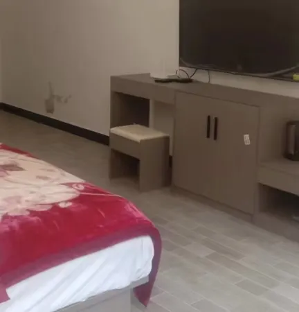 British Homestays Отели рядом с достопримечательностью «Baimazhai Village»