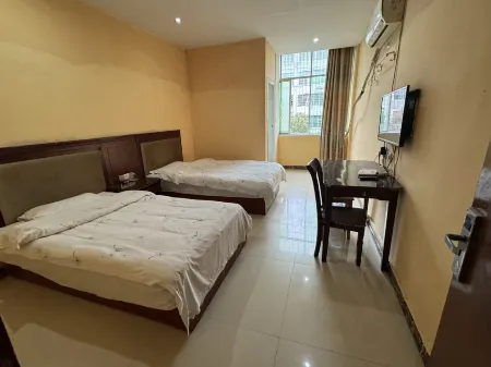 Jishui Business Hotel Отели рядом с достопримечательностью «Motan Taohua Island»