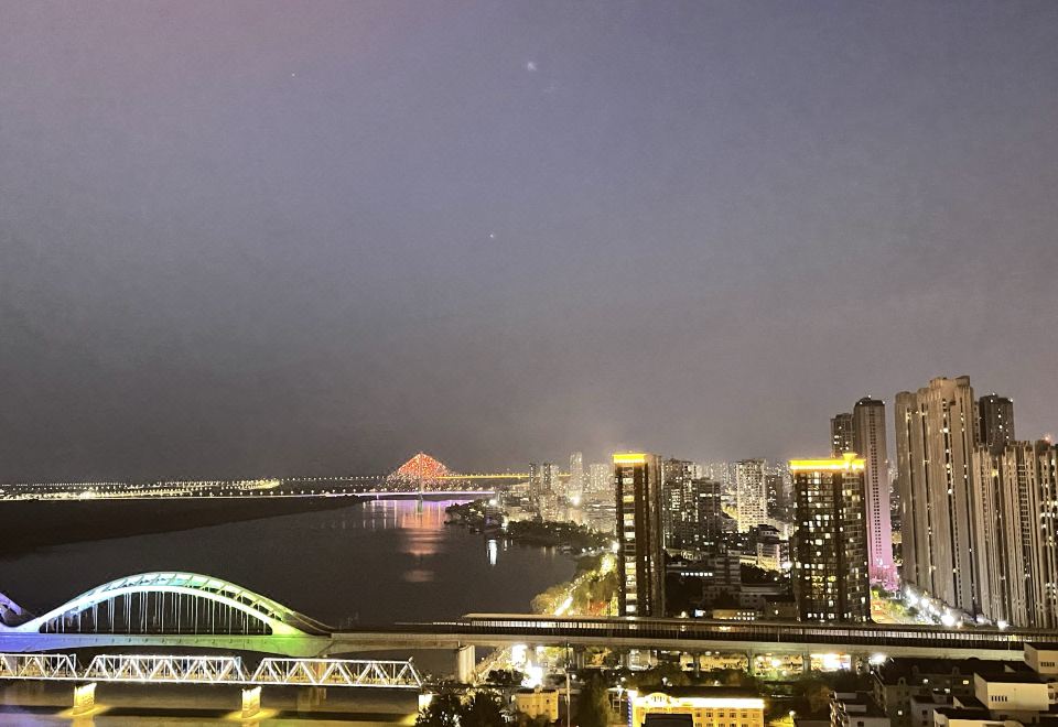 Shili Xijiang Guest House 침실