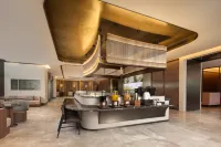 Hilton Garden Inn Jinan Olympic Sports Center - ที่มีบาร์