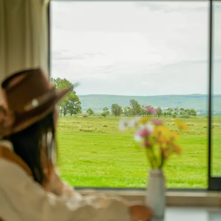 Modenge | Volcano Grassland · Hillside Scenic View | Modern Go Luxury Wilderness Hotel