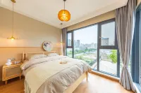 A Dream Homestay (Yichang Shuiyuecheng Dibogan) - Condos
