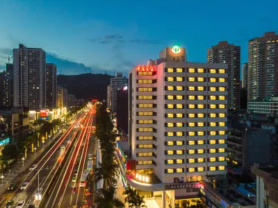 Huaqiao Hotel Hoteller i 