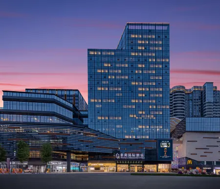 Mushang International Hotel Отели рядом с достопримечательностью «Hubei Enshi College»