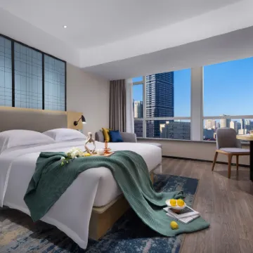 Echarm Hotel( Nanzhou Subway Station Pazhou International Convention and Exhibition Center Branch) Hotel berhampiran Stesen Datang