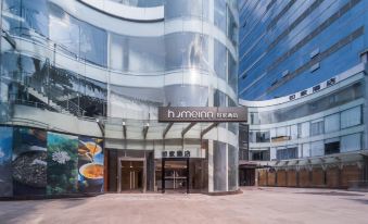 The hotel has an interesting architectural feature on its front and sides, which can be seen at the entrance at Home·NEO Hotel (Guangzhou Exhibition Center Pazhou Metro Station)