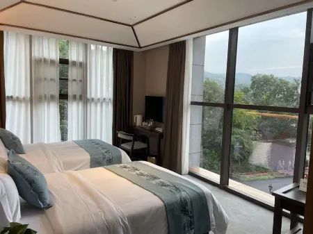 Cunshang Restaurant Homestay Отели рядом с достопримечательностью «Xinan Jiao Daxue Xiwang College Library»