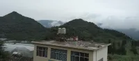 Panzhou Tongxiang Customs Inn - ห้องครัว