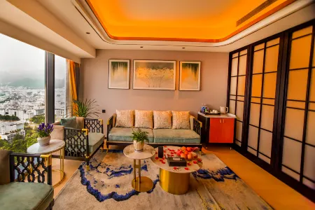 Baoshan Sanchuan she jishi guan jing  Hotel Отели в г. Баошан