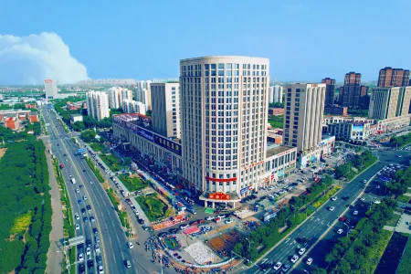 K-one  Hotel (Xin'ao Plaza Jinnan AEON Mall) Отели рядом с достопримечательностью «Tianjin Occupation Skill Public Training Center Gymnasium»