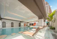 Aitingbao Hot Spring Hotel (Xishuangbanna jinghongGaozhuang Xishuangjing Xingguang Night Market) - Romantic