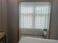 Tongbaiyun Hotel (Suqian Hongzehu East Road Sunshine 100 Shop) - 2 stelle