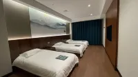 Shouxian Xinyi Business Hotel