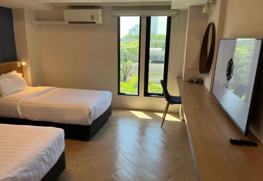 데 보탄 방나의 깔끔하고 모던한 객실 디자인