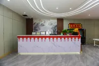 Tumxuk Yixin Business Hotel