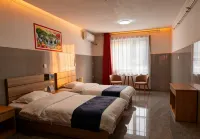 Xinjinlong Holiday Hotel (Linzhou Avenue Bus Station)