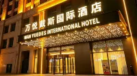Qinghai WanyueDes International Hotel 난촨시루 터미널 호텔