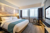Rezen Dong Hotel (Huzhou City Center High-speed Railway Station Store)