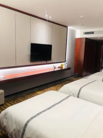 Wan Huan Hotel Отели рядом со станцией Songyuan Railway Station