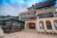 White Bird Field B&B (Jiu Shan Shan) Hotel in zona Middle-Upper Proterozoic Standard Sequence