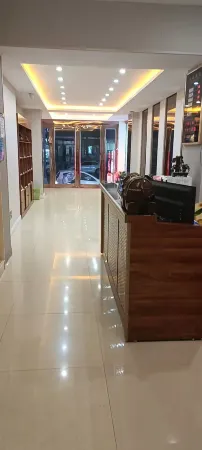 Kaige Hotel Xinzheng Отели рядом с достопримечательностью «Zhengzhou Institute of Technology»