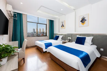 Pebble Motel (Pengtai Department Store Shopping Center) Отели рядом со станцией Huangmeidong Railway Station