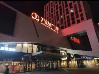 Huayang Nianhua Daily Rental Apartment (Mudanjiang Wanda Plaza)