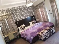 Carlton Gate Xclusive Hotel Hotels near Rosanwo Shopping Complex