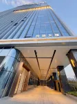 Baiyi Business Hotel (Zhengzhou East High-Speed Rail Station)