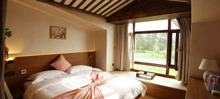 Beiji Village Beixun Wooden House Hotel 漠河のホテル