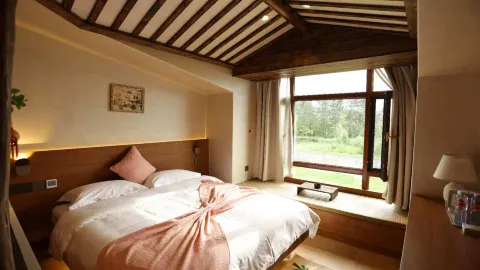 Beiji Village Beixun Wooden House Hotel in Mohe