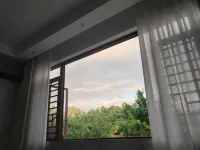 Xingyi Jinyuxuan Homestay - บริการรถรับส่ง