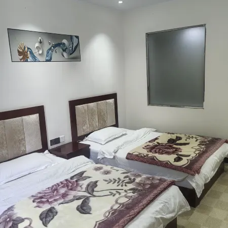 Qingchuan Yijia Xiaozhu Village Hotel