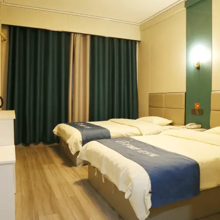 Home Huayi Hotel (Fuyang Railway Station)