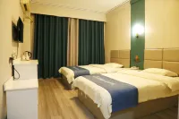 Home Huayi Hotel (Fuyang Railway Station)