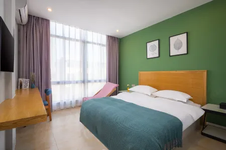 Yumingju Hotel (Haikou Meilan Airport) Отели рядом с достопримечательностью «Qiongtai Normal University (Guilinyang Campus)»