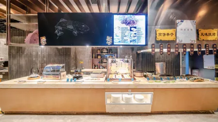 Horizon Hotel Yunnan Отели рядом с достопримечательностью «Southwest Forestry University Bailong Campus»