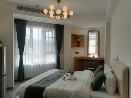 Yuxuan Yumeishe Отели рядом с достопримечательностью «Bamboo Sea Wild Animal Park»