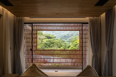 Qingxi Xiangshe woniu Hostel Отели рядом с достопримечательностью «Shenzhen Technology University»