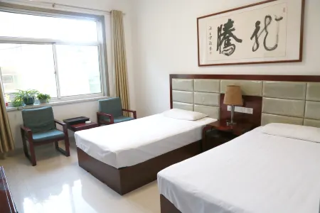 Warm Inn Отели рядом с достопримечательностью «Lvliang University»