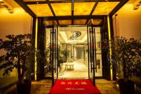 Xi'erdun Holiday Hotel Отели рядом с достопримечательностью «Пейзажный район чайного моря»