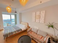 Guanhailu V+ Homestay (Yantai University Wanda Plaza) - balcony