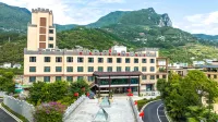 Xingshan Shuangquanzhai Hot Spring Hotel Отели в г. Синшань