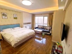 Mudanjiang Wanda Plaza Walnut Apartment