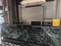 Huiyu·Xinduo Hotel (Mengzi Wencui Road Honghe Prefecture Government)