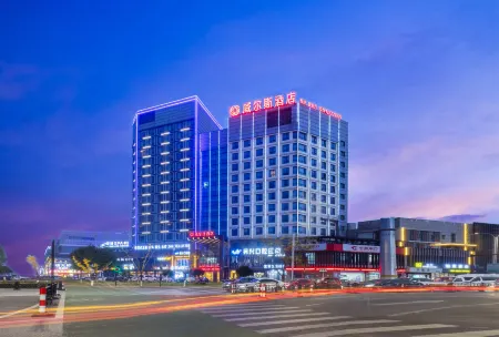 Huzhou Wells Hotel (Zhili Wuyue Plaza China Children's Wear City) Отели в г. Хучжоу