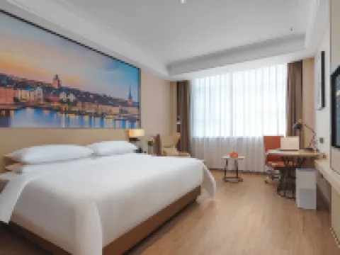 Vienna International Hotel (Ezhou High-speed railway Station Civic Center store) فنادق في أه جَو