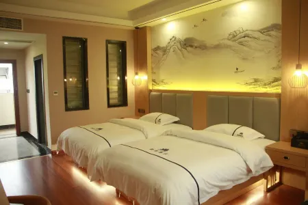 Menglian Biyi Hotel Отели в г. Менлянь